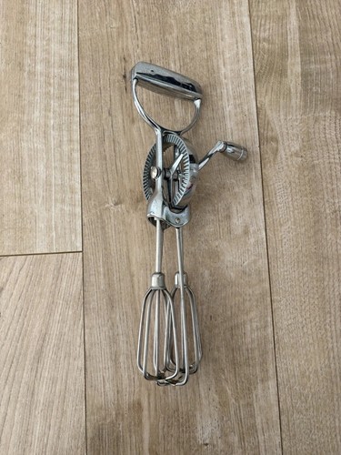 Vintage metal hand whisk - hand,
