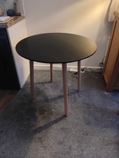 Round black wooden table