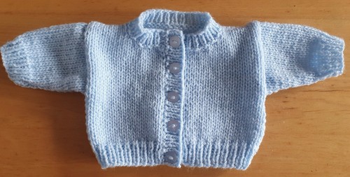 Dolls clothes hand knitted