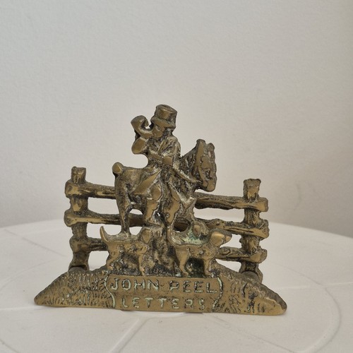 Brass letter rack - letter, featuring