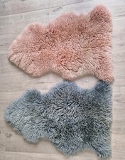 TWO 100% GENUINE SHEEPSKIN