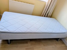 Two Ikea single divan bed with
