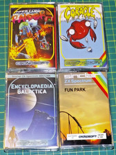SINCLAIR ZX Spectrum - Job lot of 4 new release games FUN PARK, CORACLE etc.