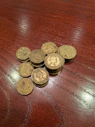 Brass three pences - 24, coins