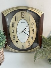 Rhythm Wood Effect Art Deco Style Wall Clock Silent Sweeping Movement