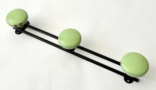 Row vintage French coat hooks