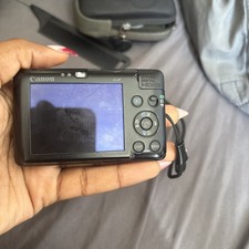 Canon Digital IXUS 100 IS 12.1MP Digital Camera - Black Case