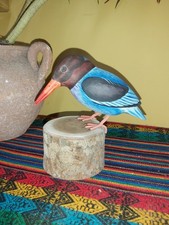HAND CARVED AND HAND PAINTED