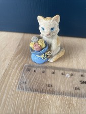 Miniature cat figurine from