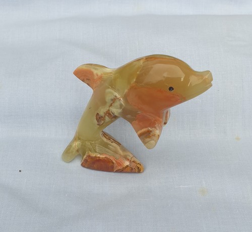 Leaping dolphin carved - leaping,
