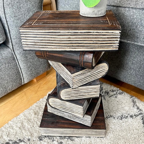 Book stack table hand carved - hand,