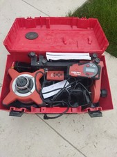 HILTI PRI 2 LASER LEVEL WITH REMOTE And HILTI PRA 22 , HARDLY USED .
