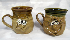 2 x PRETTY UGLY FACE MUGS