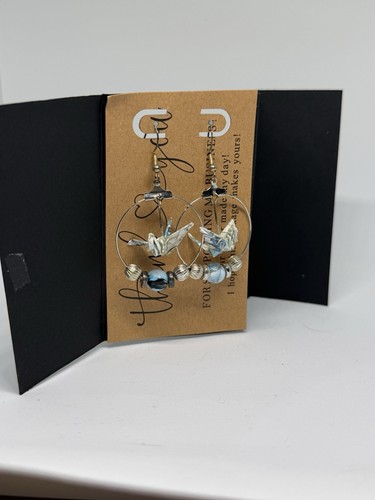 Hand made origami crane drop - hand,