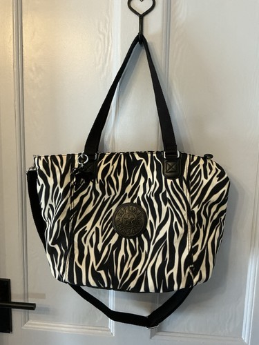 Kipling handbag with - strap, and