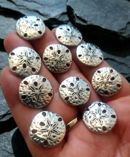 Sand dollar charms antique - sand,