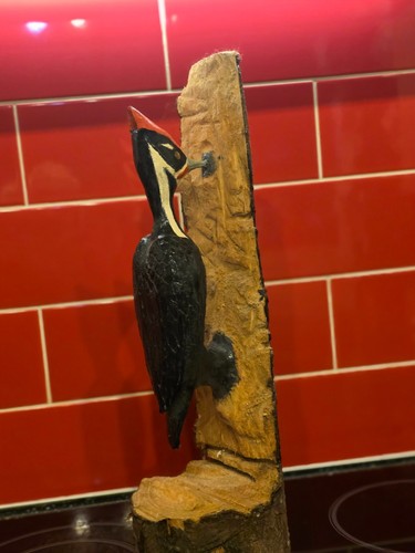 Chainsaw carved woodpecker - chainsaw,