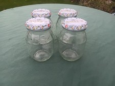 Jars x4 for preserves/storage/craft. Glass with lids (roses written). 12cm high.