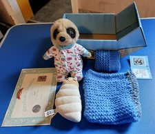 Baby Meerkat Oleg with Glow Worm