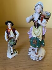 A Pair of Samson Porcelain figures in the Chelsea manner, gilt decorated bases