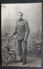 WW1 RPPC UNKNOWN BRITISH ARMY SOLDIER IN UNIFORM POSSIBLY AN OFFICER ?