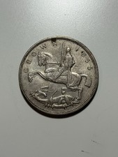 A 1935 SILVER CROWN COIN. 25