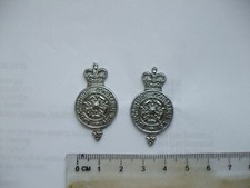 Obsolete pair, Lancashire Police Collar Dogs.