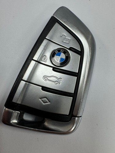Genuine bmw button remote - 4,