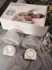 Electric breast pumps