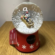 M&S Penguin Sleighing Red Snow