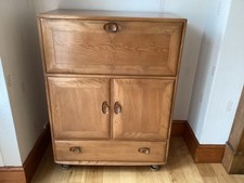 VINTAGE ERCOL  BUREAU/DESK/DRINKS CABINET in good condition