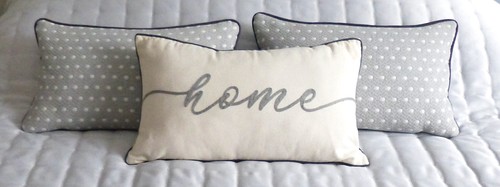 Three oblong bedroom cushions - three,