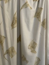 Pair Of Cream Curtains With