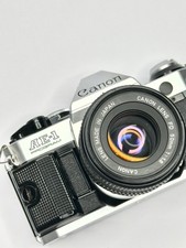 Canon AE-1 Program Vintage 35mm SLR Film Camera with FD 50mm 1.8 30 Day Warranty