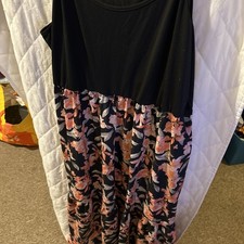 Ladies dress long length strap  size 5xl flowers and black top used 