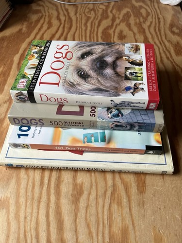 Four dog training books - four,