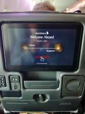 PHOTO  THE REAR OF A SEAT IN ECONOMY CLASS IN A SINGAPORE AIRLINES AIRBUS A380-8