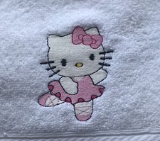 White Fluffy Bath Sheet With Embroidered Hello Kitty Ballerina Emblem.