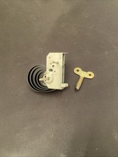 CLOCKWORK MOTOR & KEY NEW FOR