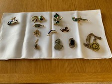 Goebel Cats plus 10 other unarmed brooches the parrot has fixing pin missing 