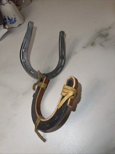Neat old horseshoe wall - old, rack