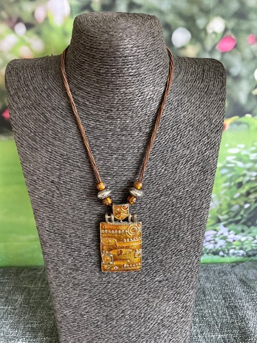 Amber tone enamel pendant