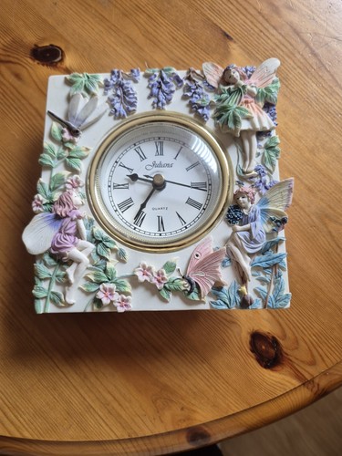 Angel porcelain clock.