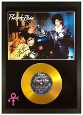 PRINCE SIGNED PHOTO AND 'PURPLE RAIN' GOLD CD COLLECTABLE MEMORABILIA GIFT BIKE