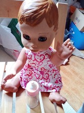 luvabella LIGHT BROWN  hair working doll -dress,nappy bottle