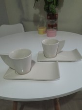 A Set Of Two Retro Ceramic