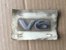 V6 - Car Badge - Still on backing