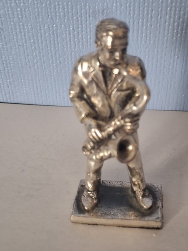 Cast silver painted - cast, jazzman