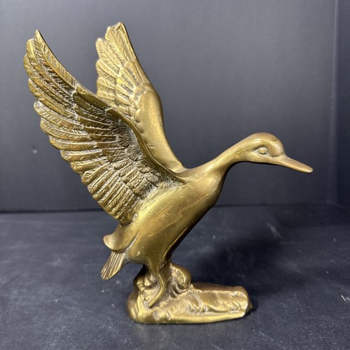 Vintage solid brass - solid, flying