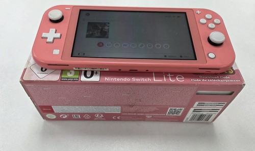 Nintendo switch lite pink - nintendo,